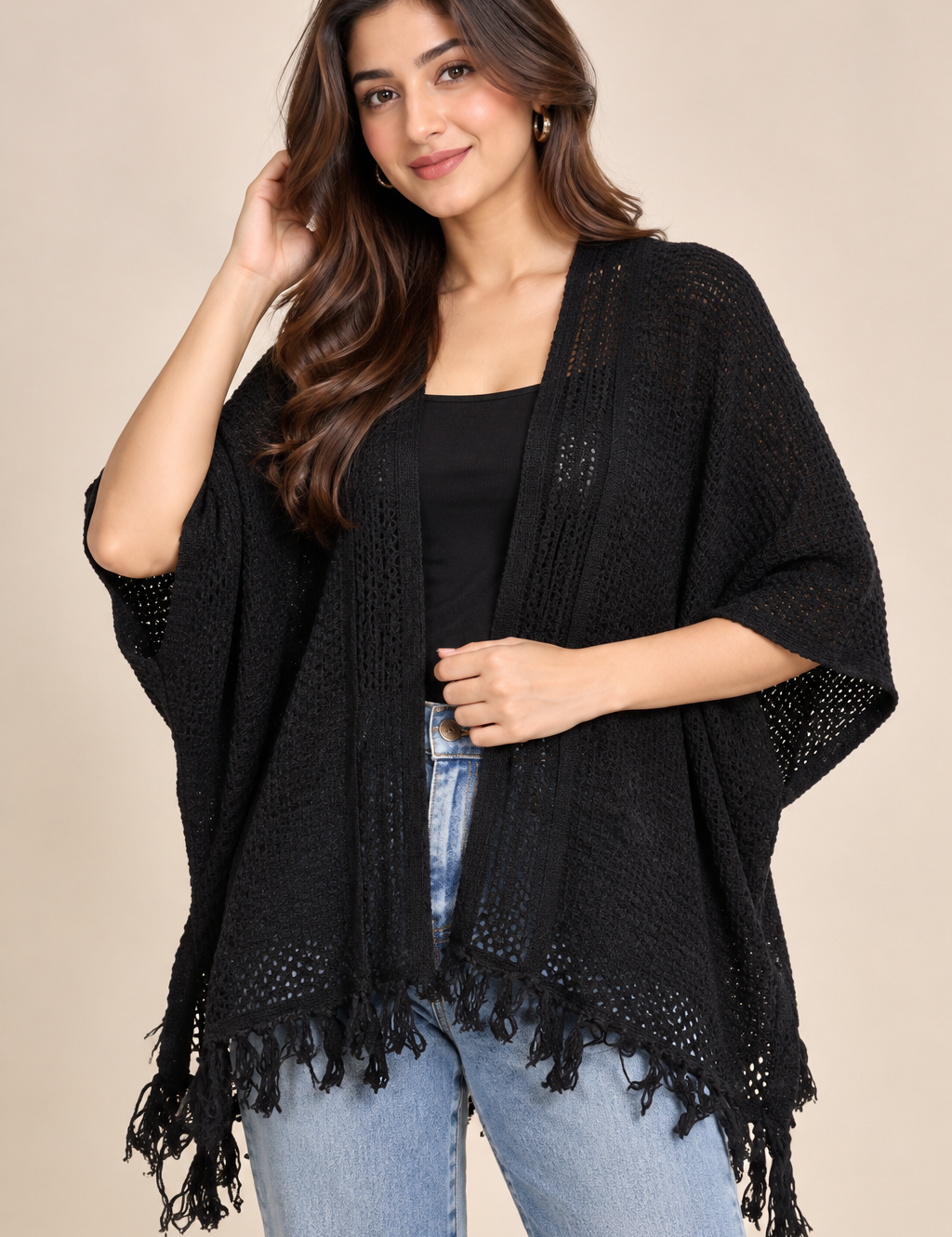  Atmosphere women’s black open-knit fringe poncho cardigan in UK Size M. Stylish relaxed layering piece with tassel hem and versatile design.