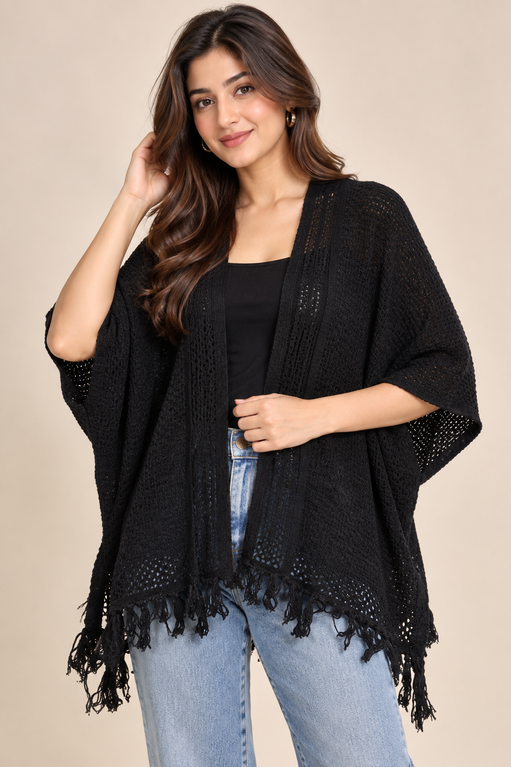  Atmosphere women’s black open-knit fringe poncho cardigan in UK Size M. Stylish relaxed layering piece with tassel hem and versatile design.