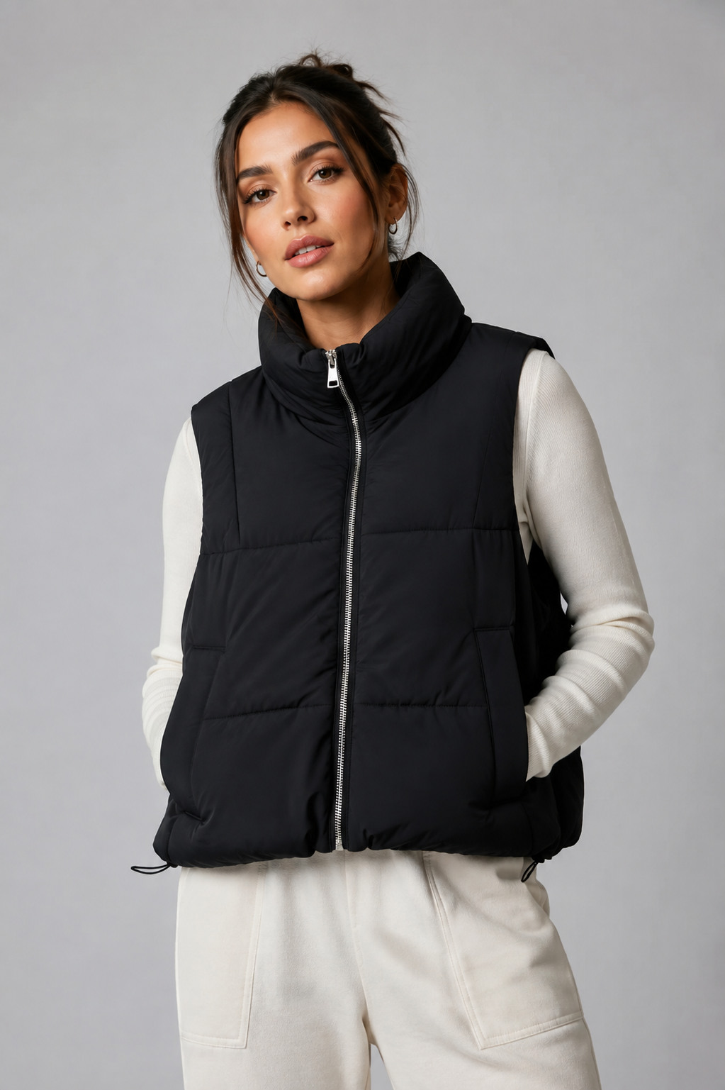 Bershka black padded puffer gilet in UK size M. Stylish sleeveless bodywarmer with high collar, front zip and practical pockets.