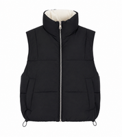  Bershka black padded puffer gilet in UK size M. Stylish sleeveless bodywarmer with high collar, front zip and practical pockets.