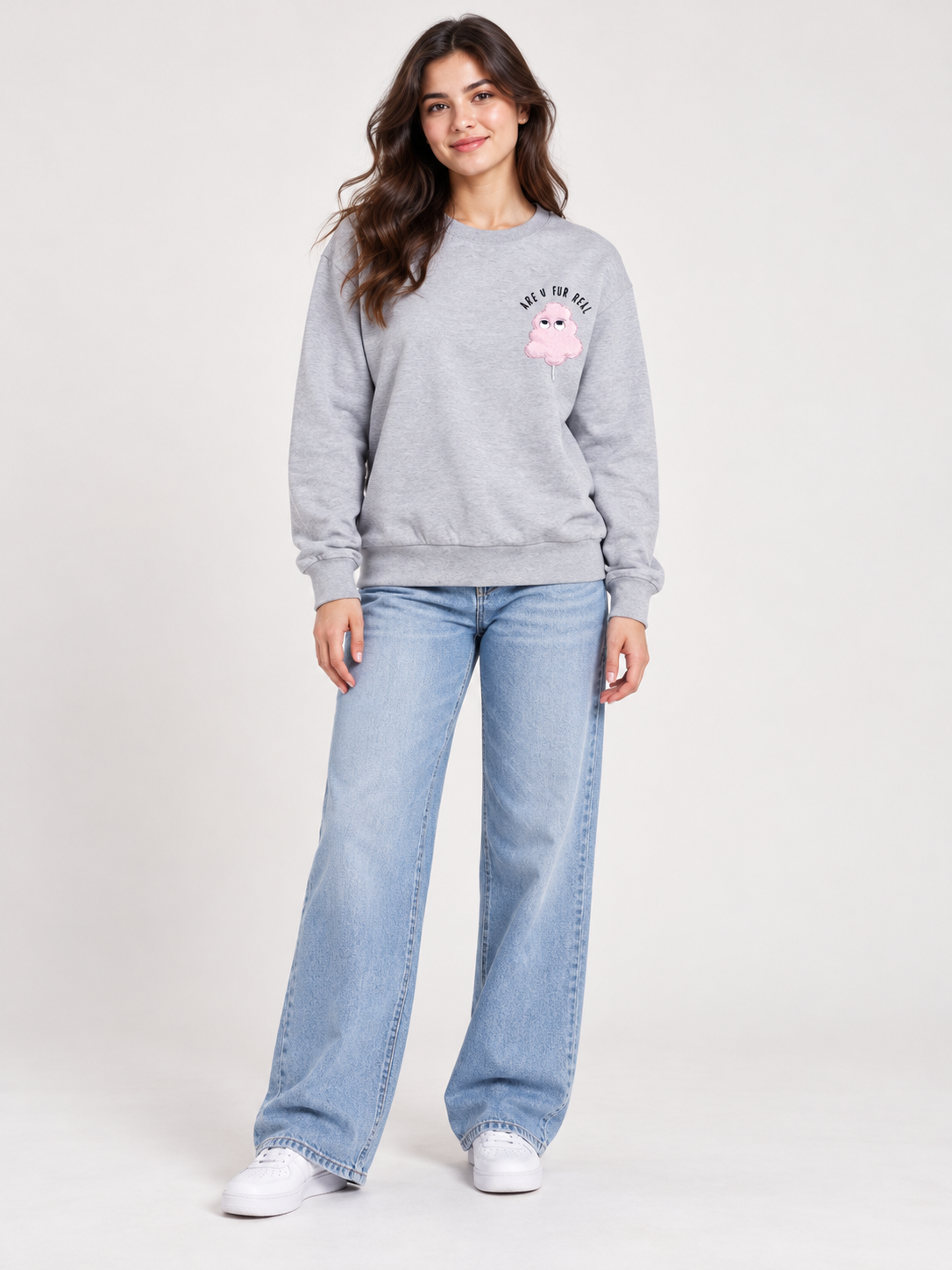   Blake Seven women’s grey graphic sweatshirt in UK size M, featuring a playful pink chest motif, crew neck and long sleeves for casual styling.