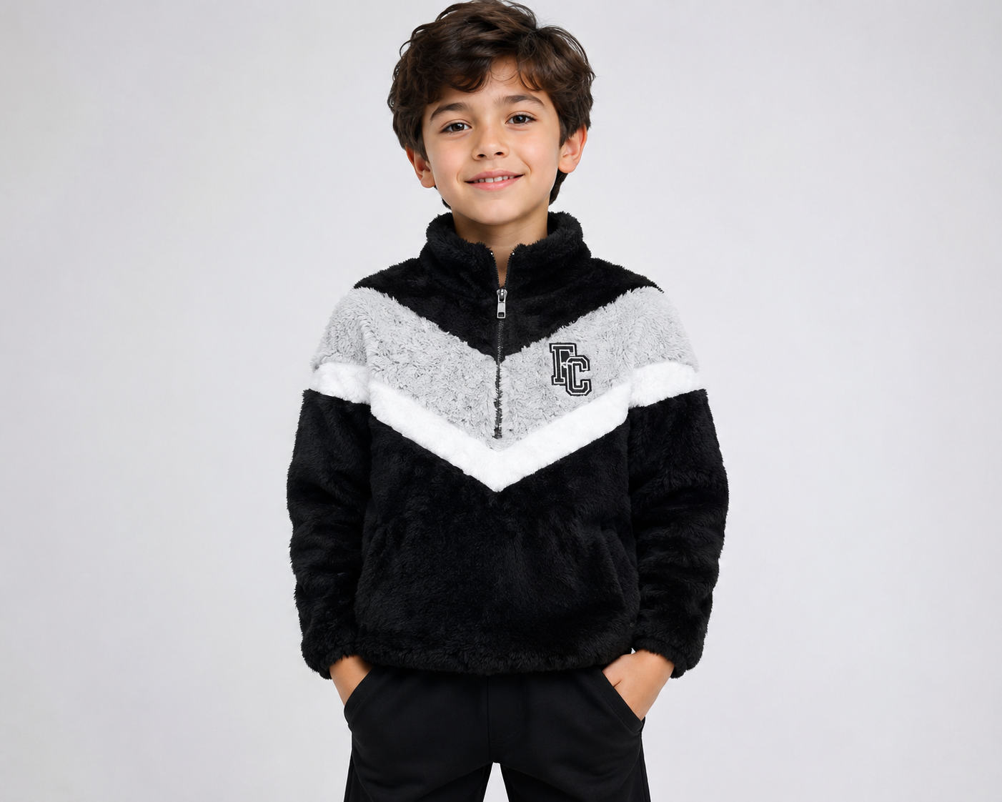  Boxer Craft boys' black and grey fleece half-zip pullover in UK size S. Cosy plush fleece, stylish chevron design and FC logo, perfect for casual wear.