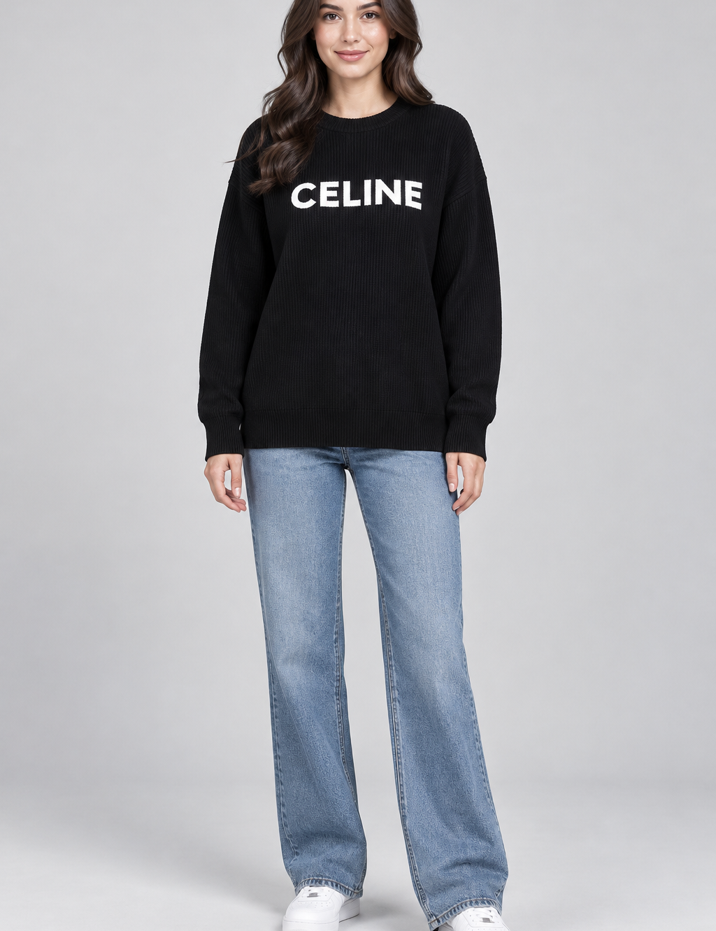  the CELINE black logo ribbed knit jumper in UK size XL. Stylish long-sleeve women’s sweater with bold white chest lettering.
