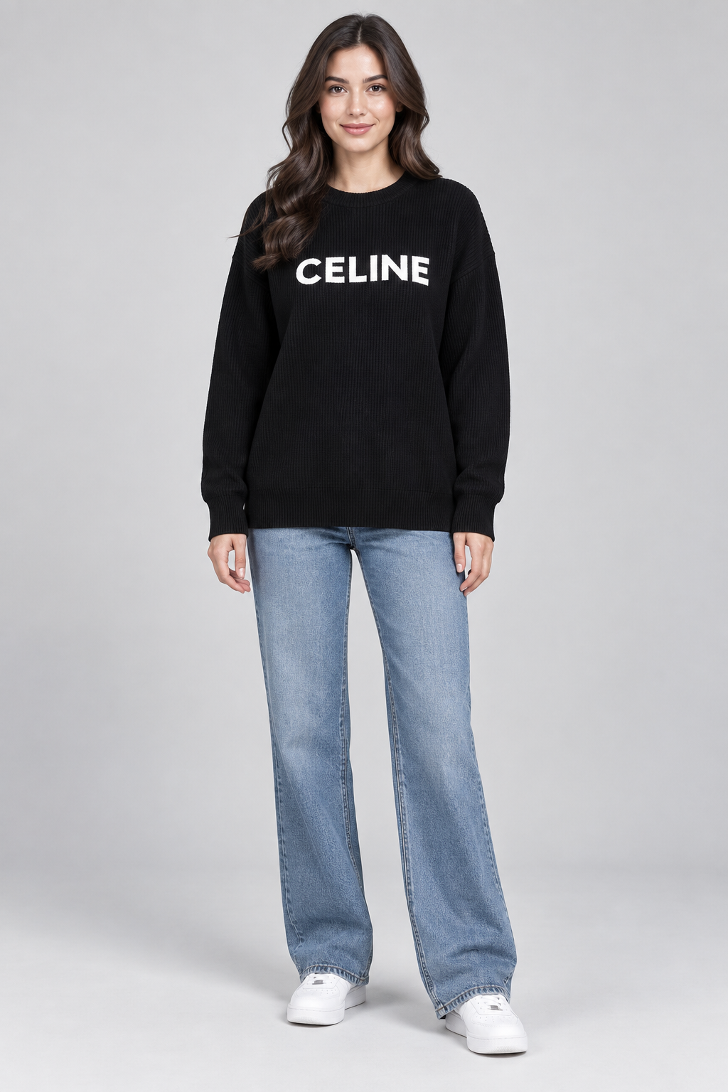  the CELINE black logo ribbed knit jumper in UK size XL. Stylish long-sleeve women’s sweater with bold white chest lettering.