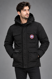 the CLASSIC VOGUE Men’s Black Hooded Padded Winter Jacket in UK Size XL. Stylish, warm and practical design with multiple pockets, hood and full front fastening.