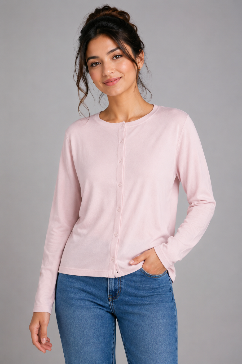  Classic women’s light pink button-front cardigan in UK size 14. Long-sleeve knit design with a timeless style, perfect for casual wear, work and layering.