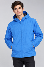 Cotton Traders men’s blue hooded windbreaker jacket in UK 2XL. Lightweight design with full zip, hood, elasticated cuffs and practical pockets.