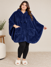 COZEE Women's Navy Blue Fluffy Fleece Hooded Poncho Blanket in UK One Size. Soft, cosy oversized loungewear with hood, pom-pom ties and pockets.