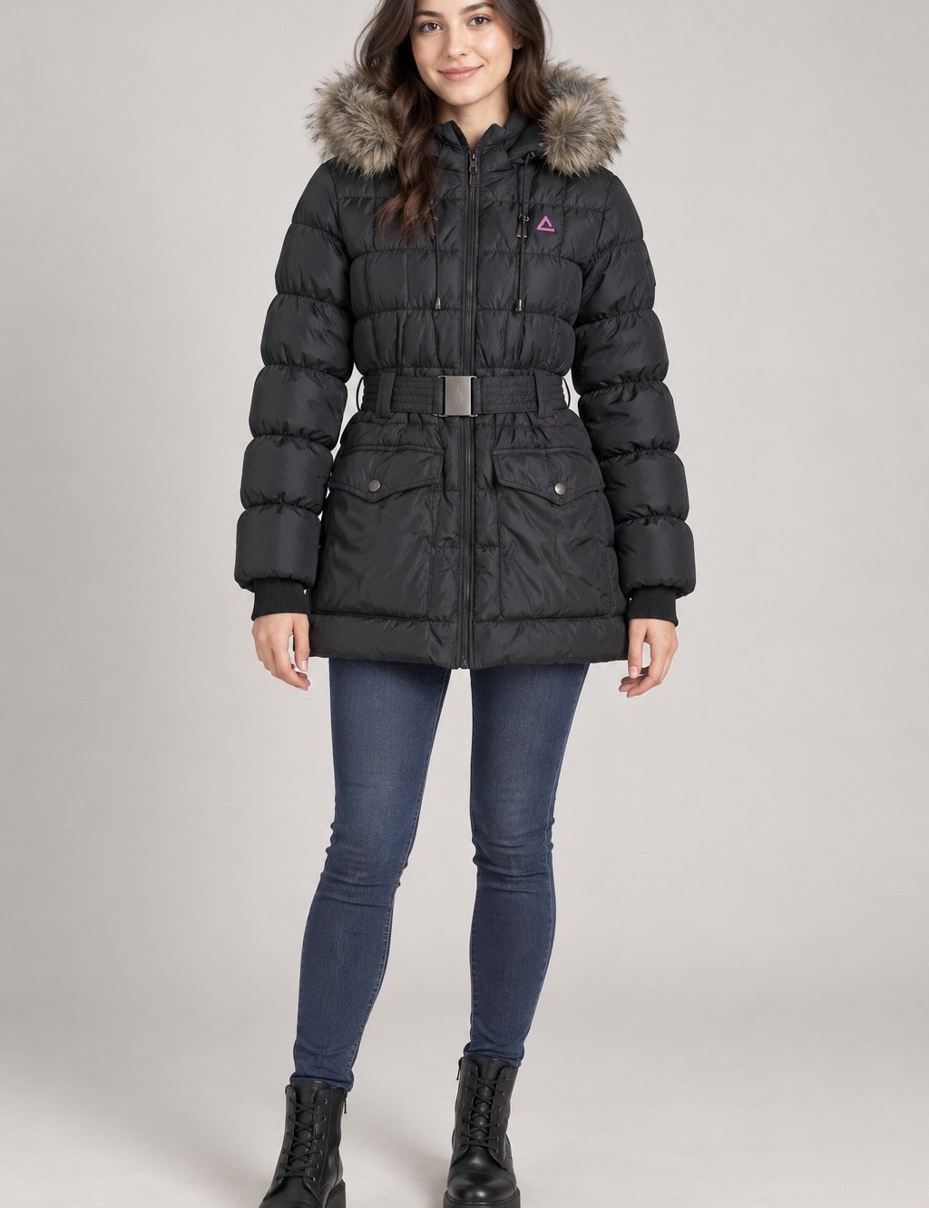  Dare 2B women’s black faux fur hooded belted puffer coat in UK size 36. Warm quilted winter jacket with zip closure and flap pockets.