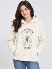  Disney women’s cream sherpa fleece hoodie in UK size M, featuring a cosy hood, soft fluffy texture and fun “I’d Rather Be In Bed” graphic.