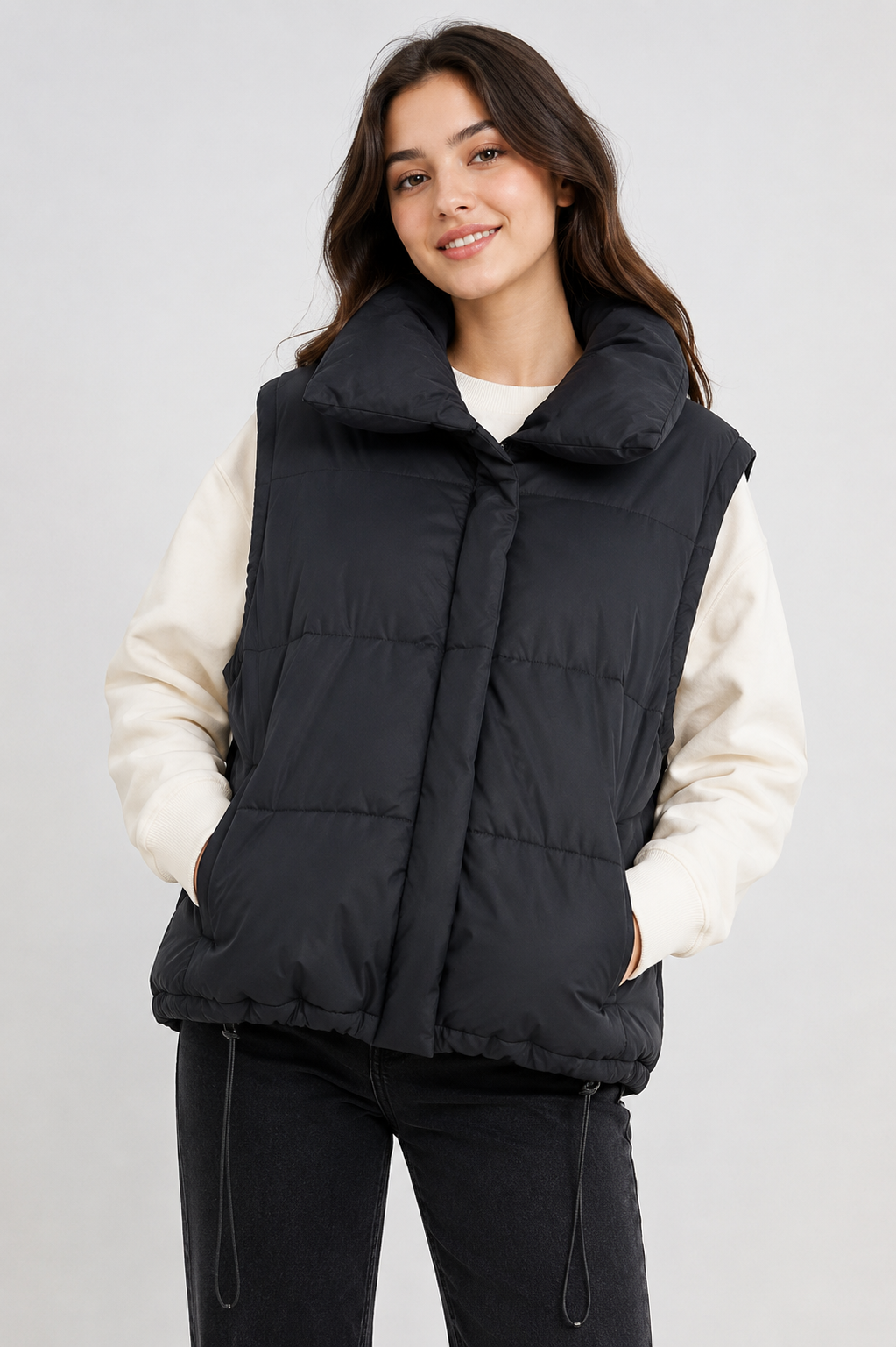  DYG Black Padded Puffer Gilet in UK Size M. Quilted sleeveless design with high collar, side pockets and adjustable drawcord hem. Perfect for stylish layering.