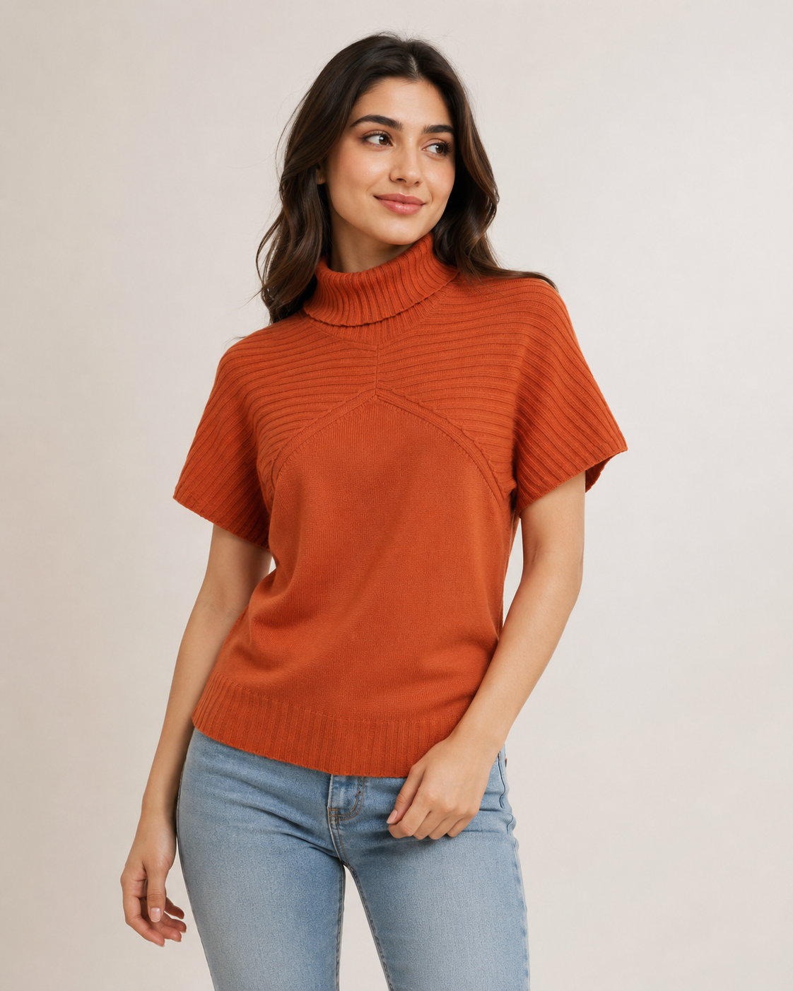  E-vie women’s rust orange ribbed high neck knit top in UK size 16. Stylish short-sleeve design with a comfortable fit, perfect for casual and smart-casual outfits.