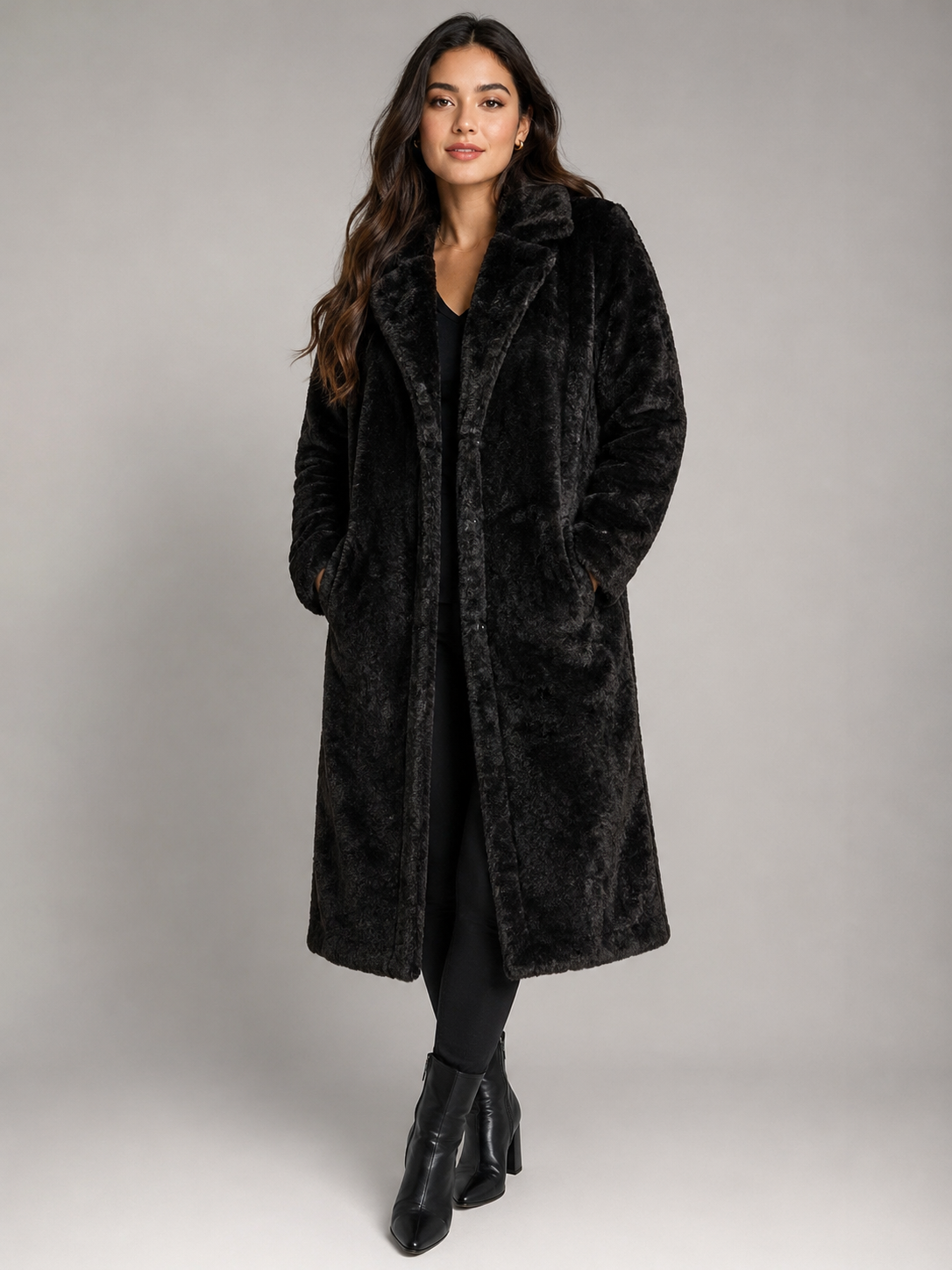  F&F black faux fur long coat in UK size M. Soft, stylish and warm teddy-style winter coat with an elegant classic design.