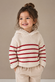 F&F Girls Cream & Red Striped Knitted Hooded Jumper in UK 3–4 Years. Cozy knit, stylish stripes, hooded design and perfect for everyday winter wear.