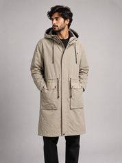 F&F men’s beige hooded parka coat in UK Size 14. Longline utility design with adjustable hood and spacious pockets, perfect for casual everyday wear.