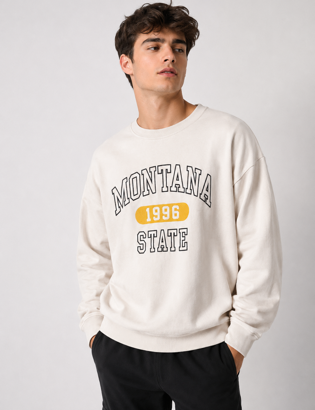   F&F Montana State 1996 cream sweatshirt in UK Size 12. Stylish varsity graphic, crew neck and long sleeves make it ideal for casual everyday wear.