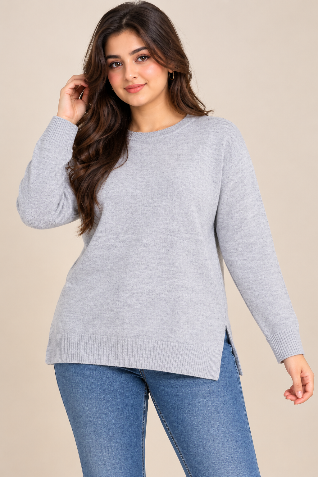  F&F women’s light grey knit jumper in UK size 12, featuring a round neck, long sleeves, ribbed trims, side slits and stylish back zip detail.