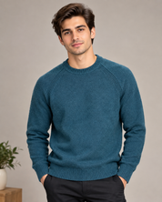 men’s teal blue knitted crew neck jumper in UK Size L. Stylish long-sleeve sweater with ribbed cuffs and hem, perfect for casual everyday wear.