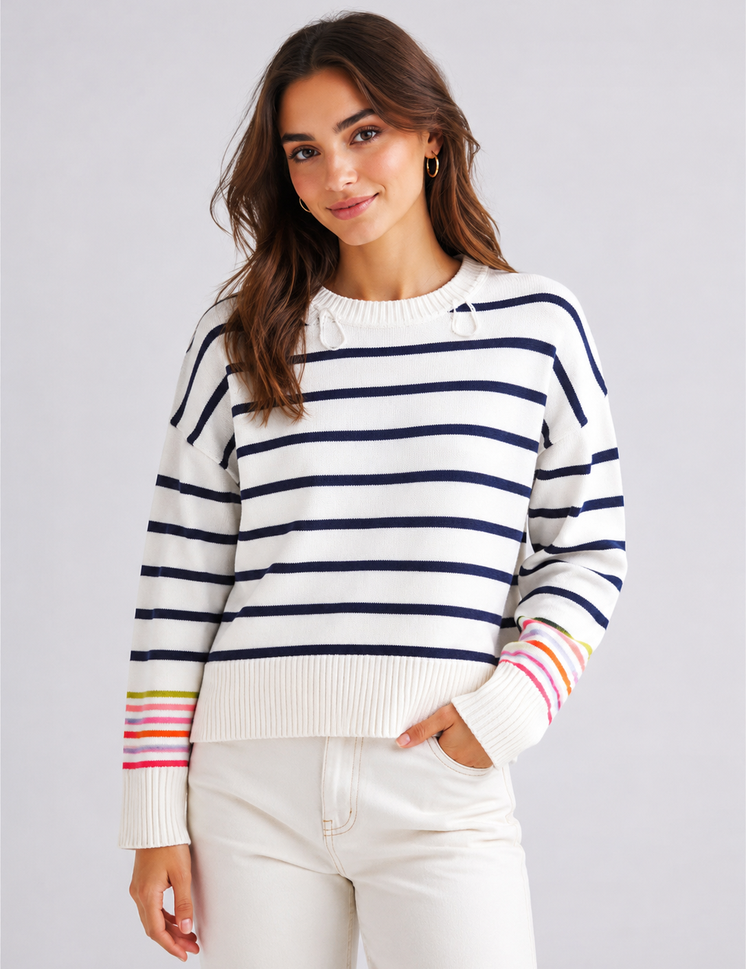 George women's striped knit jumper in UK Size M, featuring cream and navy stripes, colourful sleeve detailing and a cosy relaxed fit.