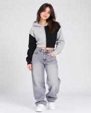 Girl's black and grey colour block cropped zip-up hoodie, featuring a stylish hood, full zip fastening and comfortable fit for everyday casual wear.