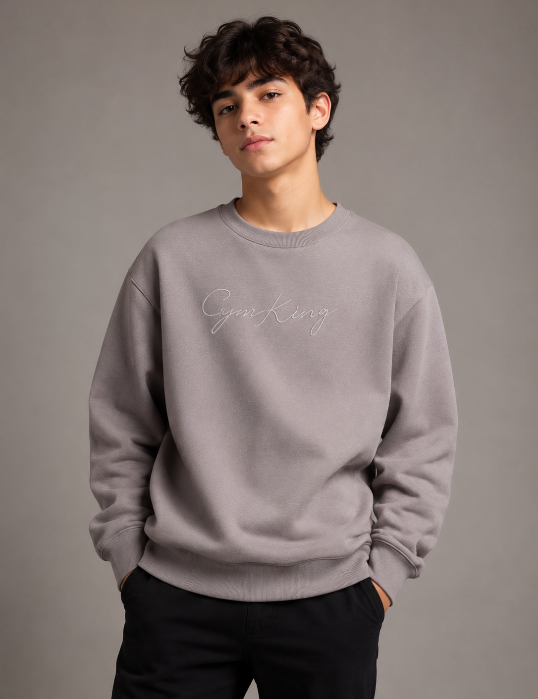  Gym King Men's Grey Embroidered Crew Neck Sweatshirt. Premium cotton blend, regular fit, soft fleece feel, and authentic Gym King branding. Perfect for casual wear and everyday comfort.