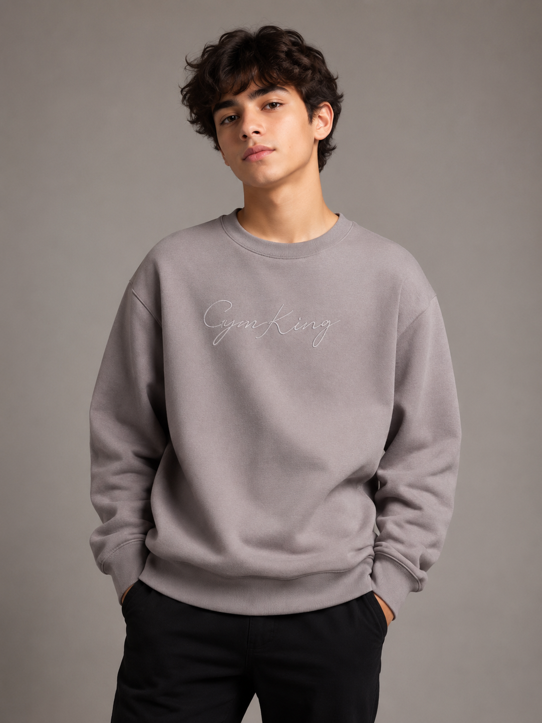  Gym King Men's Grey Embroidered Crew Neck Sweatshirt. Premium cotton blend, regular fit, soft fleece feel, and authentic Gym King branding. Perfect for casual wear and everyday comfort.
