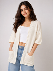 H&M cream knit cardigan in UK Size S. Stylish open-front design with elbow-length sleeves, textured knit finish and two front pockets.