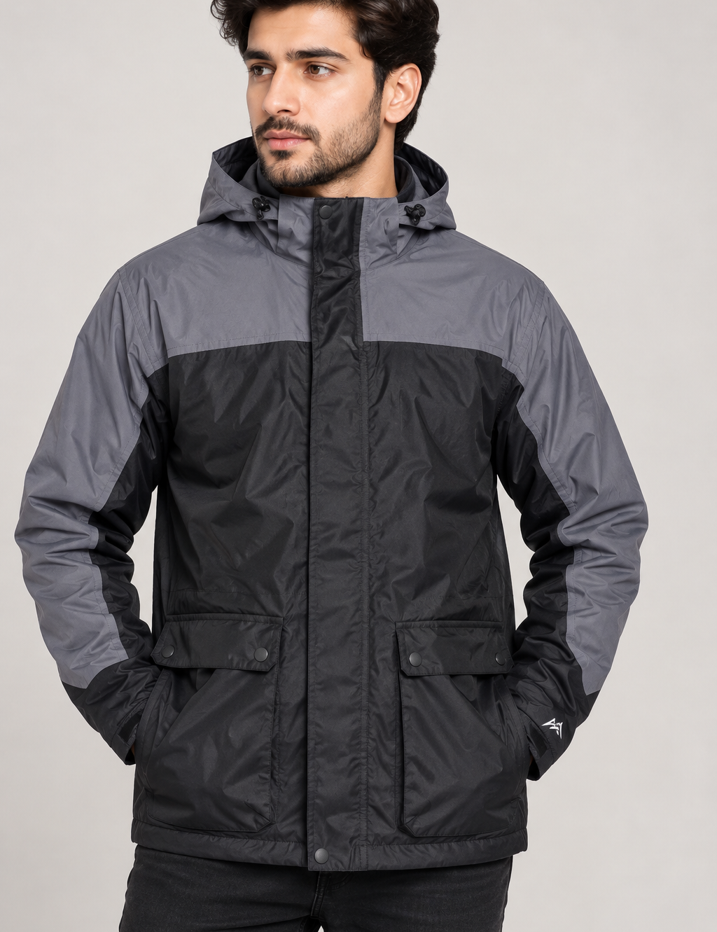 HAWKRIDGE men’s black & grey hooded outdoor jacket in UK Size XL. Practical two-tone design with front pockets, long sleeves and comfortable fit.
