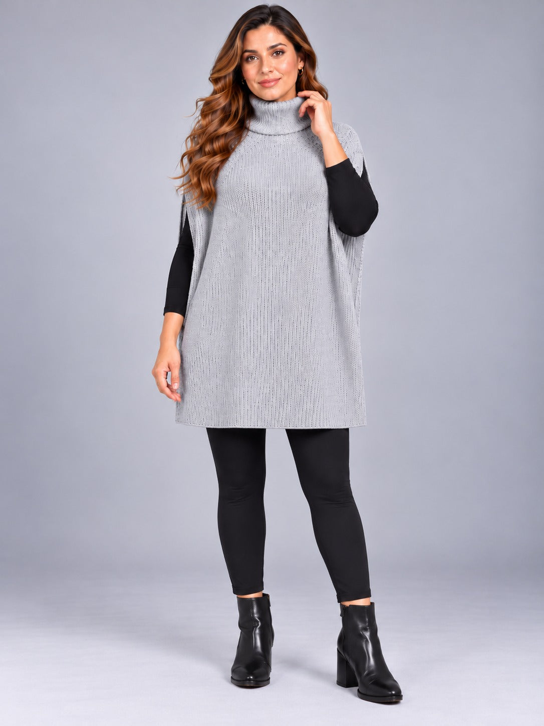   Jenerique women’s grey roll neck knitted poncho in One Size. A relaxed, sleeveless longline layer for effortless autumn and winter styling.