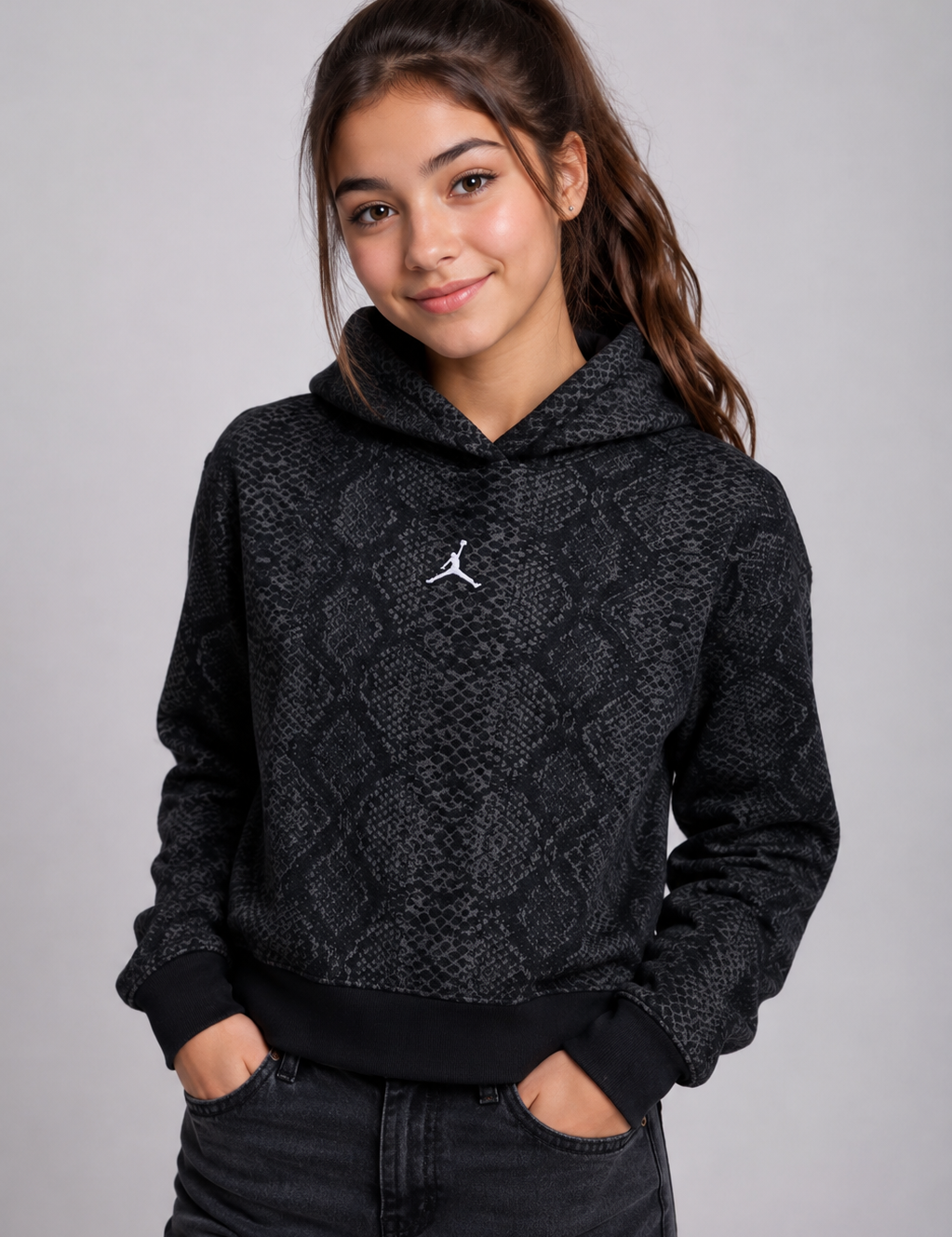   stylish Jordan girls’ black snake print hoodie, UK size 13–15 years. Comfortable hooded design with long sleeves, ribbed trims and iconic Jordan branding.