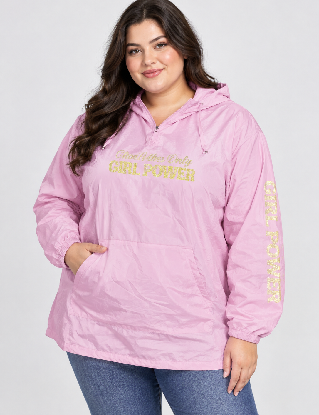this Just Hoods pink hooded pullover windbreaker in UK 3XL, featuring a gold Girl Power print, half-zip front, drawstring hood and kangaroo pocket.