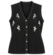  KOLETTE women’s black embellished sleeveless knit vest in UK Size S/M. Stylish V-neck, button front and textured detailing for versatile layering.