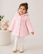   Ladybird girls' pink faux fur hooded coat in UK size 3-4 years. Soft, cosy and stylish with a cute bow detail, perfect for winter days and outings.