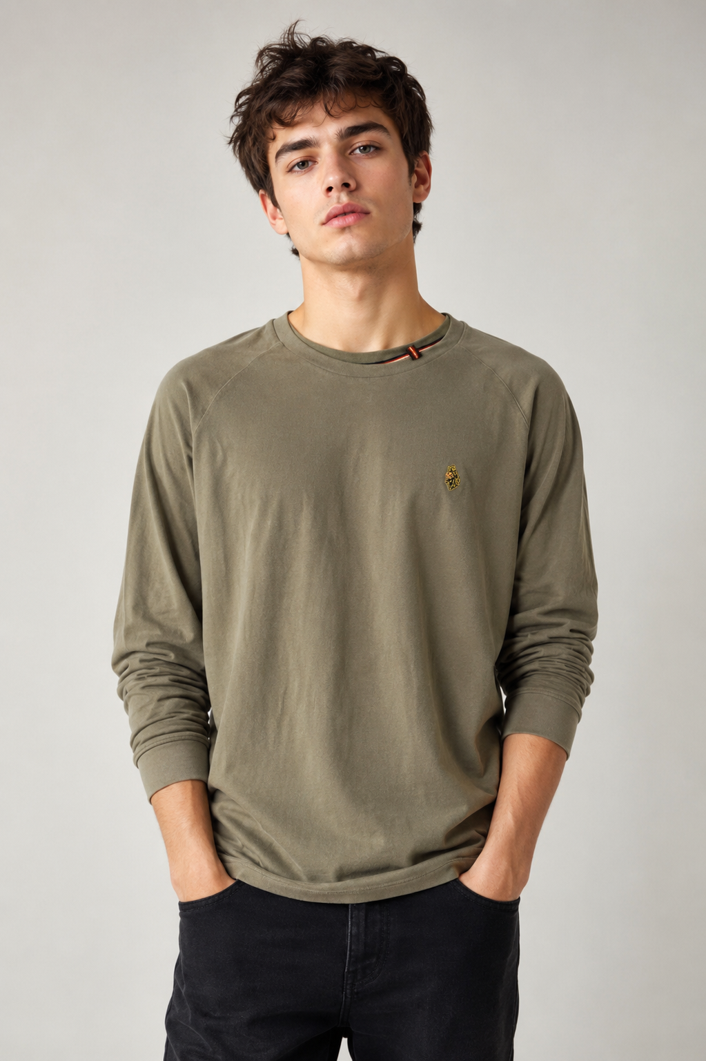 LUKE SPORT olive green sweatshirt in UK Size L, featuring a classic crew neck, long sleeves, subtle embroidered branding, and a versatile casual design. A great choice for everyday outfits, layering, and relaxed streetwear styling.
