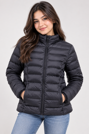  M&S women’s black puffer jacket in UK Size XS. A lightweight quilted winter jacket with full zip and high collar for stylish everyday wear.