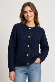 M&S Women’s Navy Blue Cable Knit Cardigan in UK Size 12. Classic button-front design with textured cable knit, long sleeves and ribbed trims.