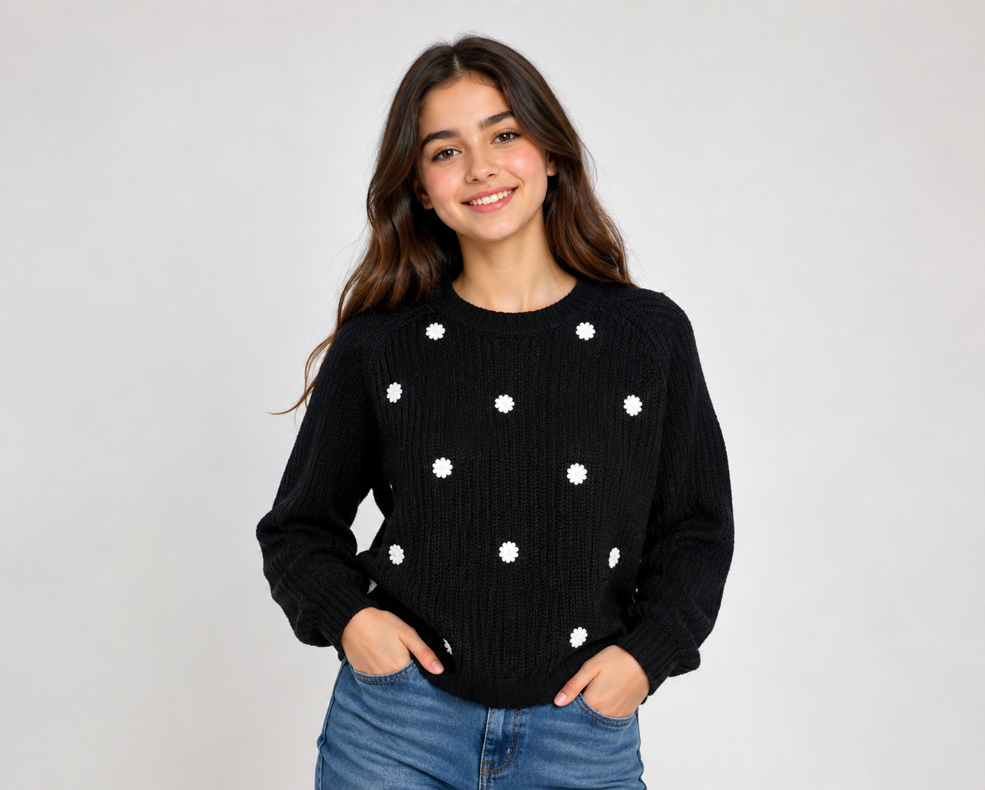  New Look girls’ black knitted jumper in UK size 10 with cute white floral details. Stylish, comfortable and perfect for casual everyday outfits.