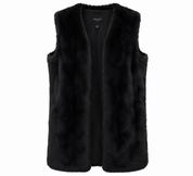 NEW LOOK Women’s Long Black Faux Fur Gilet in UK Size 20. A stylish longline sleeveless vest with a soft faux-fur finish, perfect for layering.