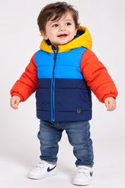  Next baby boys colour block puffer jacket in UK size 9–12 months. Warm hooded padded design with zip fastening, perfect for winter wear.