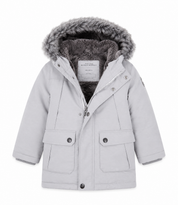 Keep your little one warm and stylish during the colder months with this Next Baby Boys Grey Faux Fur Hooded Winter Parka Jacket. Crafted with comfort and practicality in mind, this premium winter coat features a soft faux fur-lined hood, warm padded insulation, ribbed inner cuffs, and a secure front zip with snap-button storm flap for added protection against chilly weather.