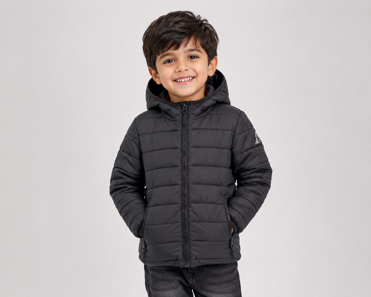 Next Kids Black Hooded Puffer Jacket for boys aged 5–6. Warm quilted design with hood, zipper closure, and practical pockets for winter wear.