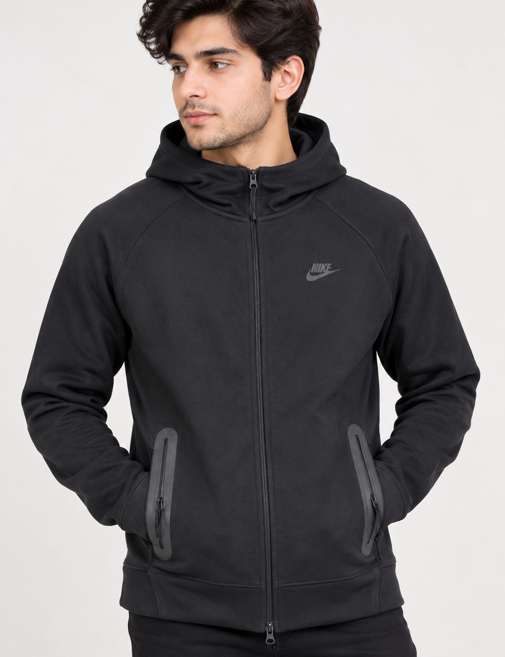 NIKE Men’s Black Full-Zip Hooded Jacket in UK Size M. Stylish sportswear jacket with hood, zip pockets and classic NIKE detailing.