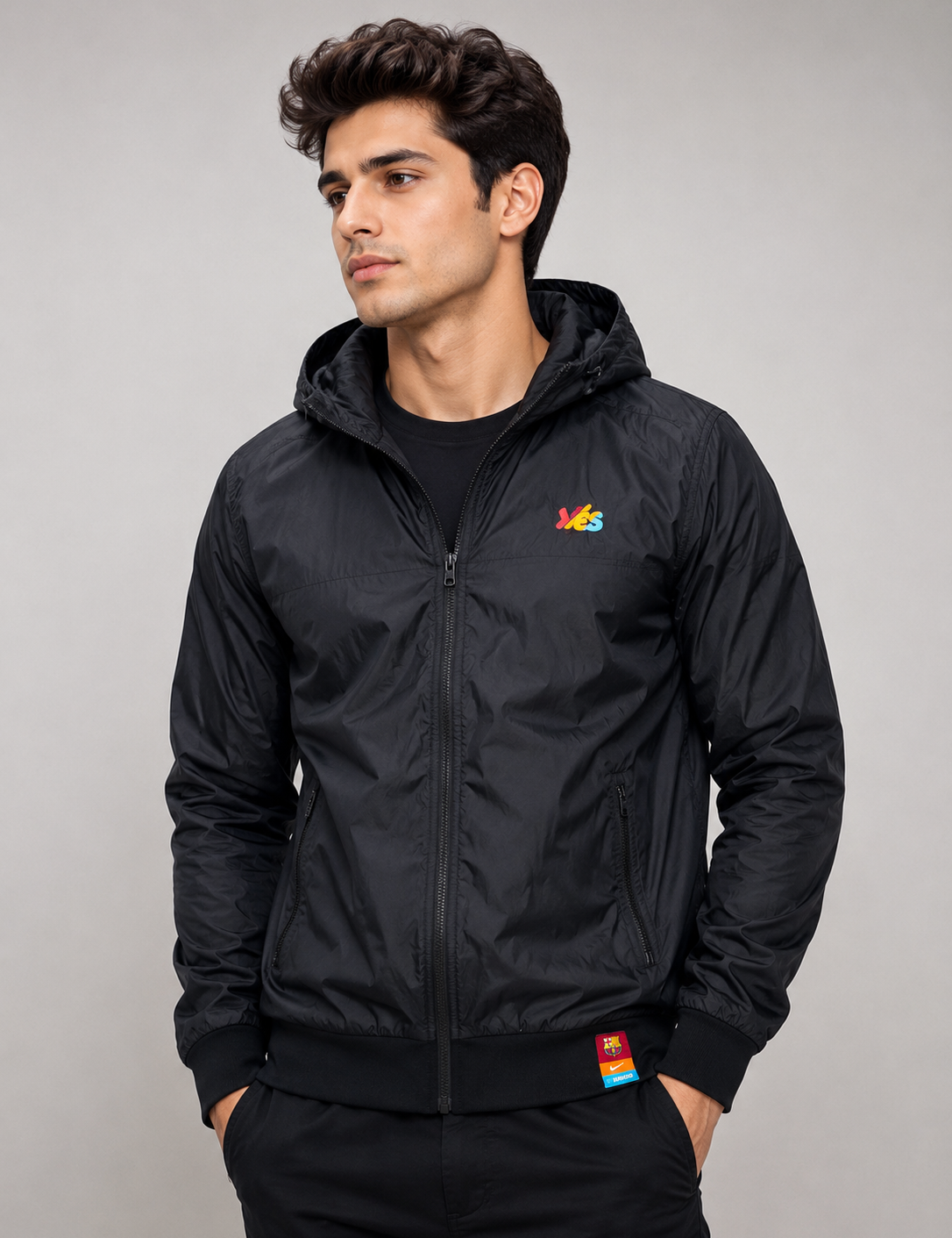  Nike Men's Black Hooded Windbreaker Jacket featuring a lightweight wind-resistant design, hood, full zip closure, zip pockets, and premium comfort. Perfect for casual wear, sports, travel, and everyday style.