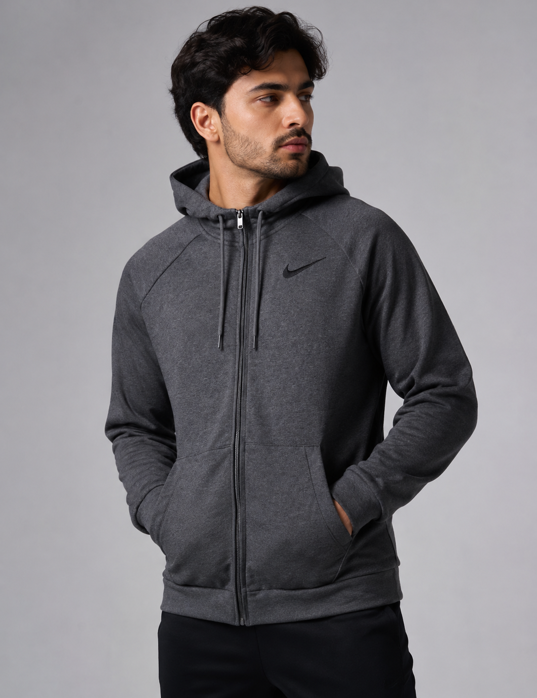  Nike men's charcoal grey full-zip hoodie in UK Size L. Stylish hooded sweatshirt with zip fastening, kangaroo pockets and classic Nike branding.