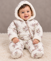 Nutmeg Baby Boys Floral Quilted Snowsuit in cream, featuring a cosy sherpa-lined hood, padded design and built-in footies. Perfect winter baby outerwear.