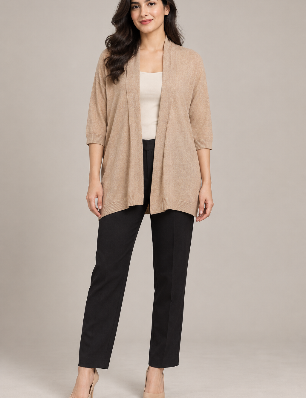   Peacocks women’s beige open-front knit cardigan in UK size 12. A soft longline layering essential with ribbed cuffs and stylish draped collar.