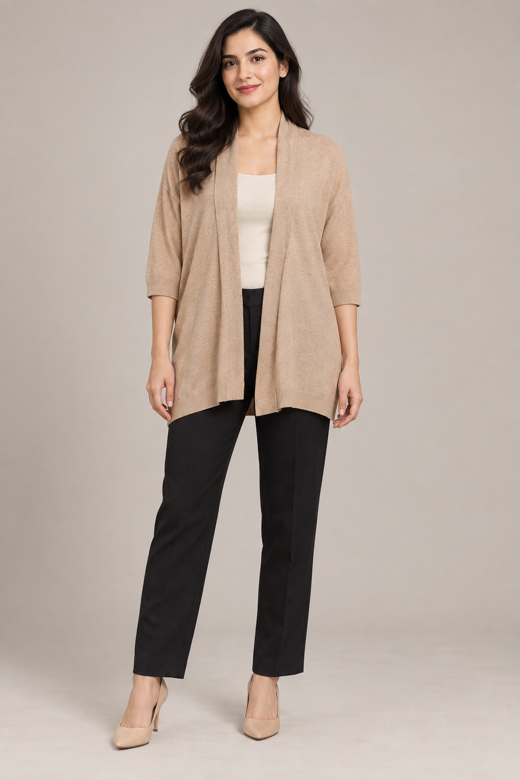   Peacocks women’s beige open-front knit cardigan in UK size 12. A soft longline layering essential with ribbed cuffs and stylish draped collar.