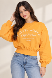  PEP & CO women’s orange Saint-Tropez cropped sweatshirt in UK Size L, featuring balloon sleeves, elasticated cuffs and a stylish smocked hem.