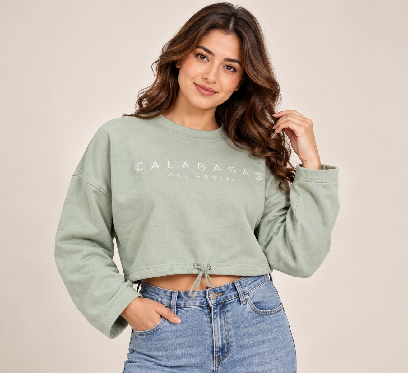  Pep&Co women’s sage green Calabasas cropped sweatshirt in UK Size L. Relaxed fit, long sleeves and adjustable drawstring hem. Original UK customer return.