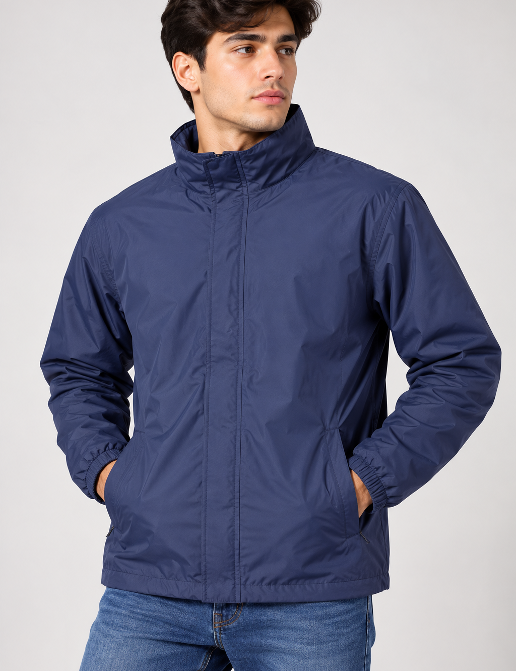 Peter Storm men’s navy blue lightweight windbreaker jacket in UK Size M. Practical outdoor styling with zip fastening, high collar and pockets.